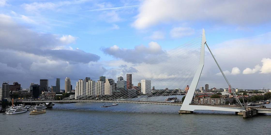 © Martin Falbisoner (CC BY-SA 4.0)
Source: https://commons.wikimedia.org/wiki/File:Erasmusbrug,_September_2019.jpg Erasmus Bridge and the Rotterdam skyline